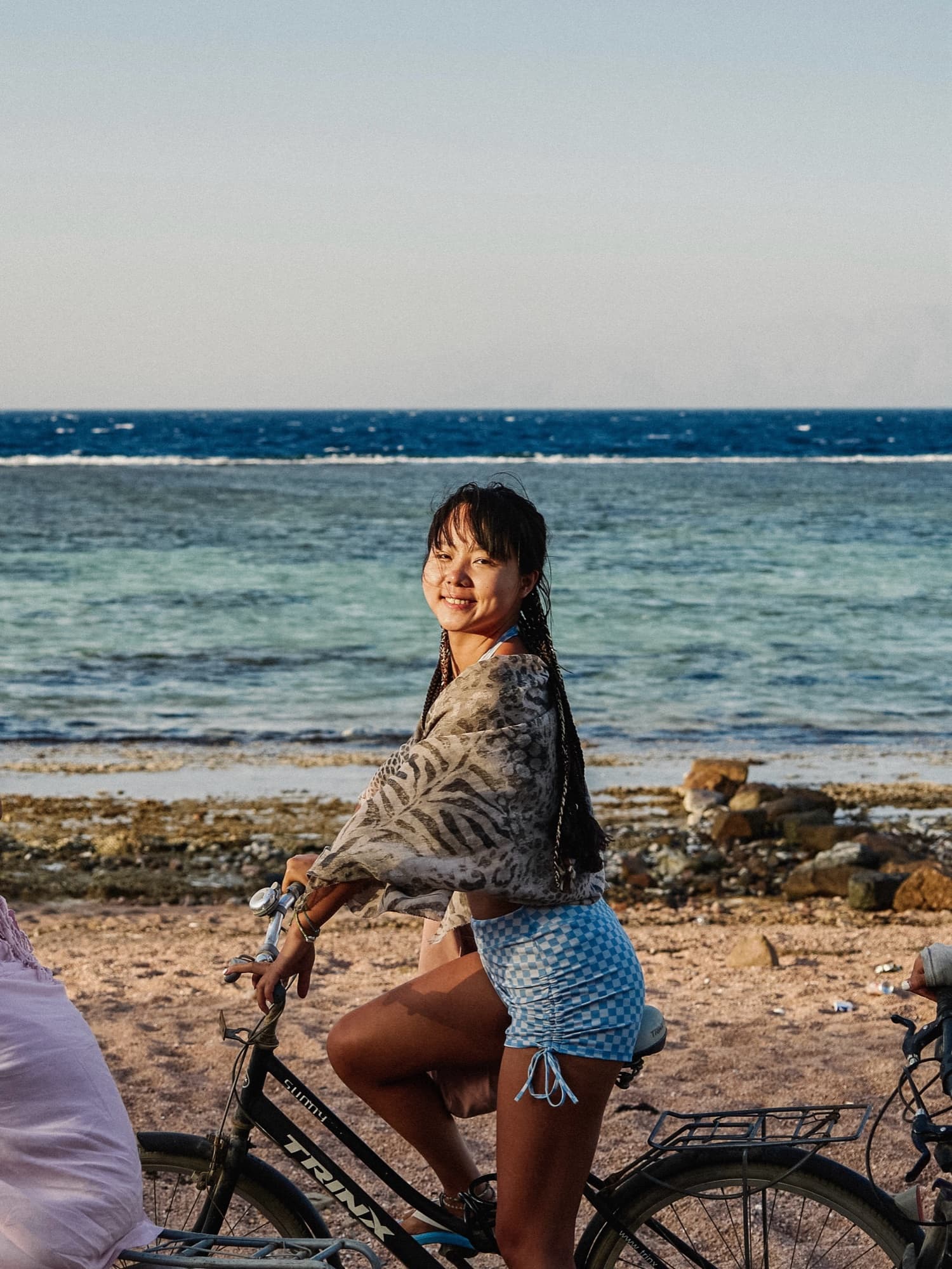 Riding a bike along the sea